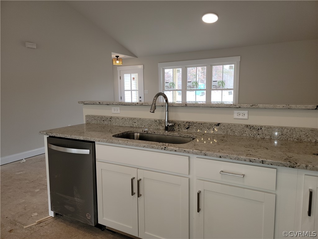 12013 Corte Castle Road Chesterfield, VA 23838 - Photo 7 of 43 a kitchen with granite countertop white cabinets and window
