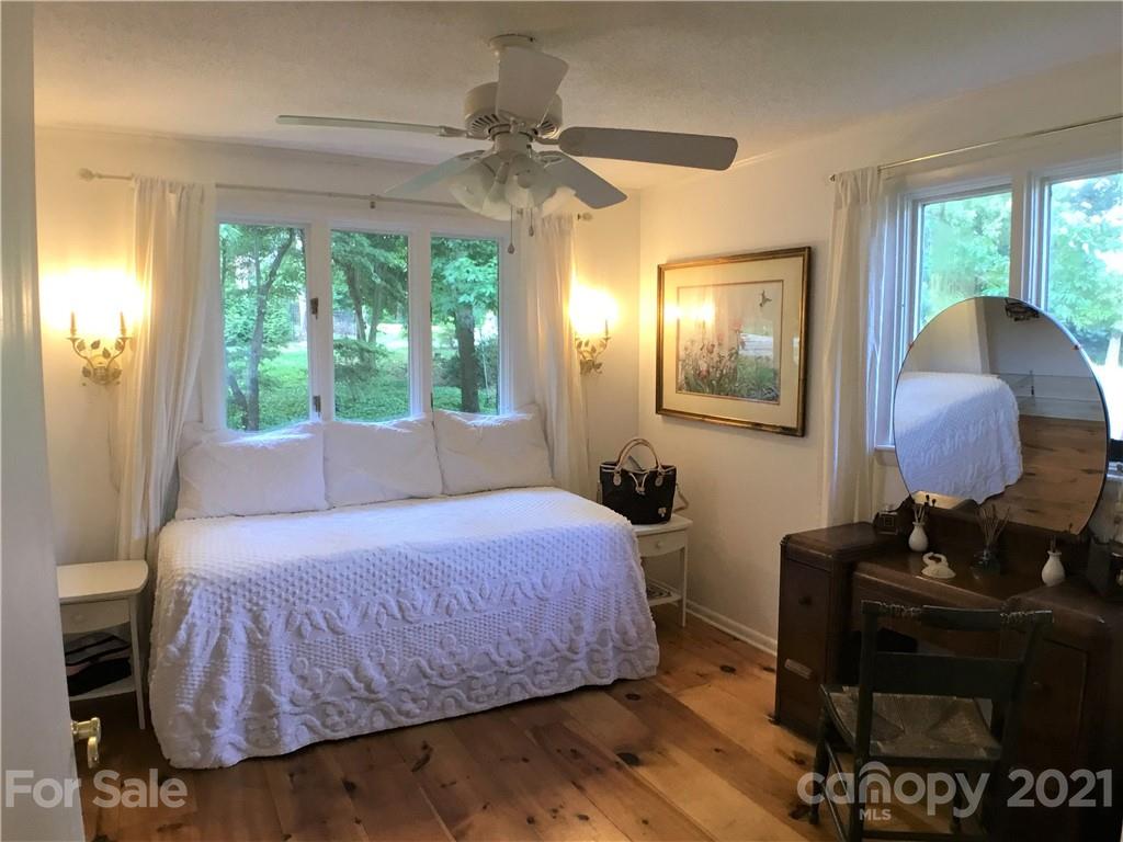 3956 Lake Shore Road South Denver, NC 28037 - Photo 17 of 44 a bedroom with a bed and a window