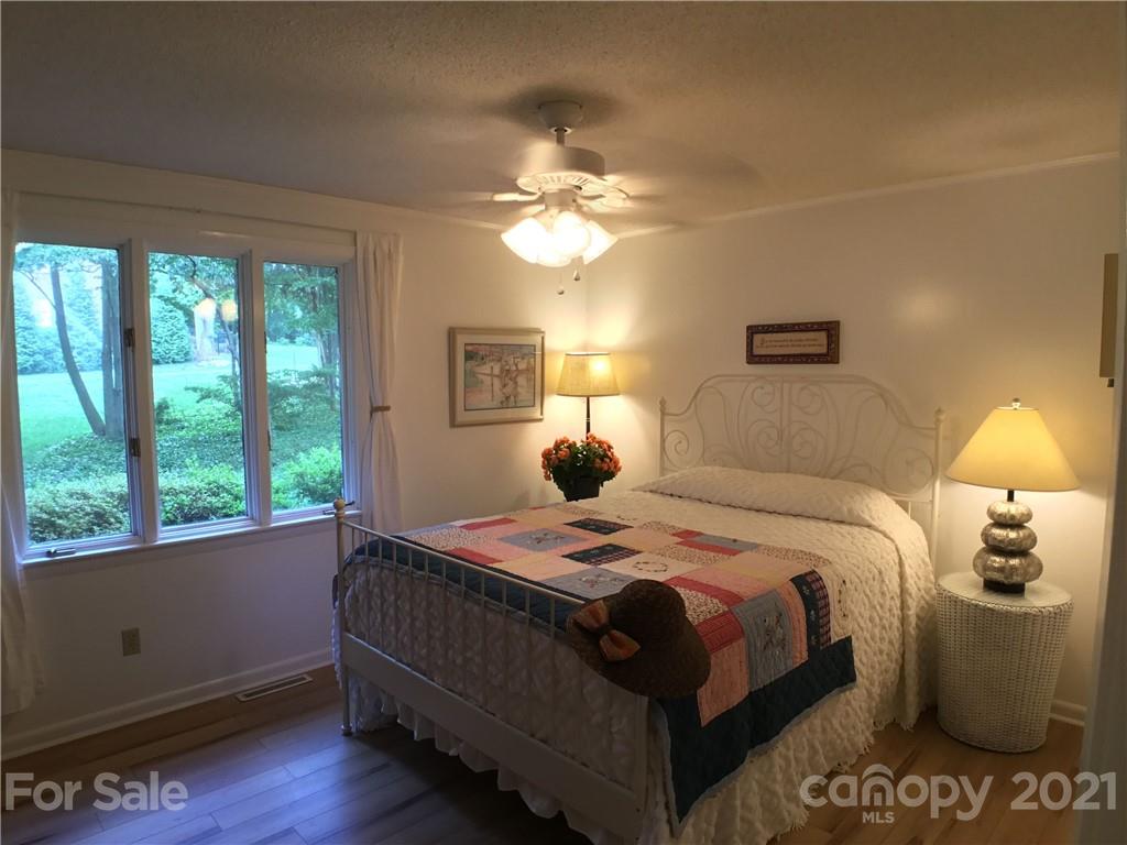 3956 Lake Shore Road South Denver, NC 28037 - Photo 20 of 44 a bedroom with a bed and a window
