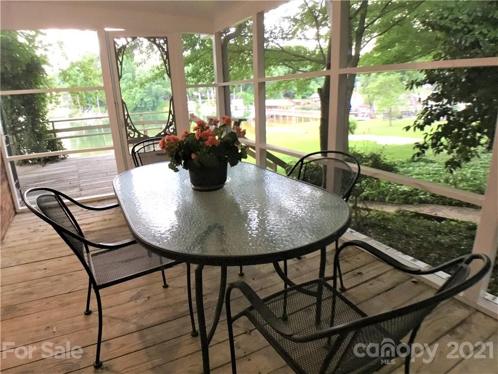 3956 Lake Shore Road South Denver, NC 28037 - Photo 23 of 44 a view of a chairs and table in the outdoor space