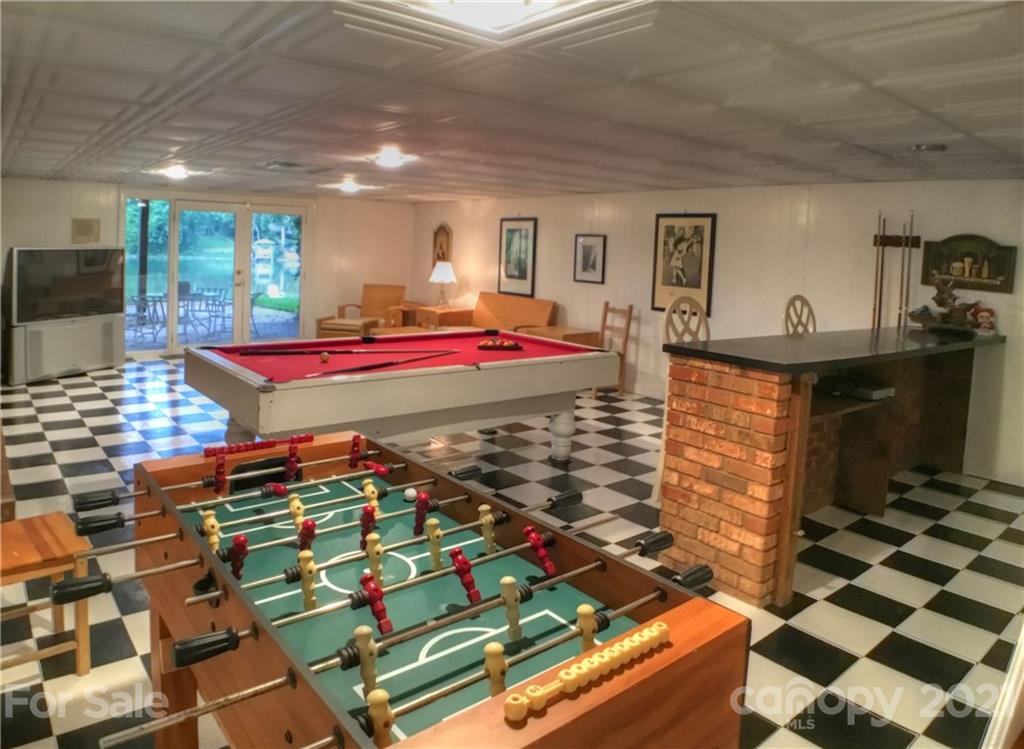 3956 Lake Shore Road South Denver, NC 28037 - Photo 24 of 44 a room with pool table and glass windows