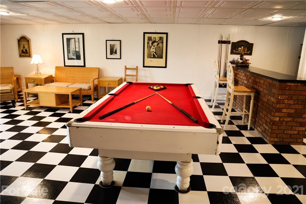 3956 Lake Shore Road South Denver, NC 28037 - Photo 25 of 44 a room with a black white checkered floor and a black white checkered floor