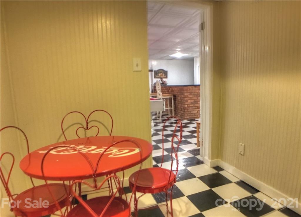 3956 Lake Shore Road South Denver, NC 28037 - Photo 27 of 44 a room with a table and chairs