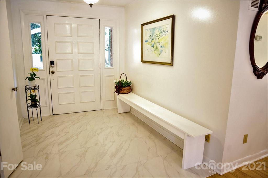 3956 Lake Shore Road South Denver, NC 28037 - Photo 7 of 44 a view of a hallway with wooden floor and closet