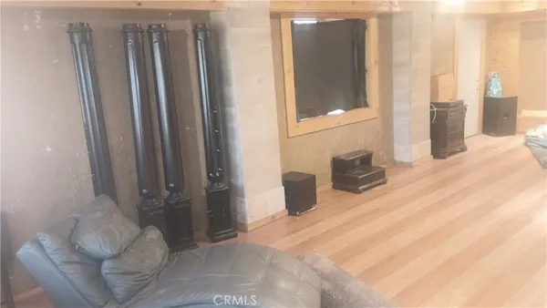 a view of a room with door and stairs