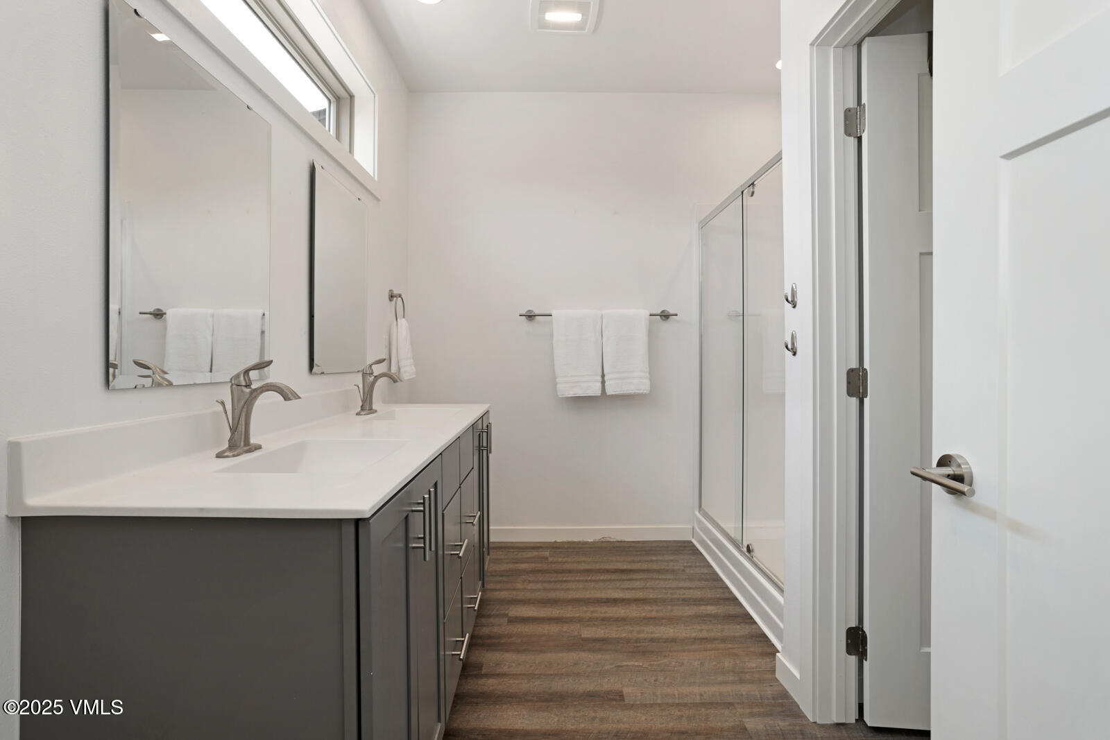 32 Flat Tops Court, Unit L3 Eagle, CO 81631 - Photo 18 of 28 a bathroom with a sink and a mirror