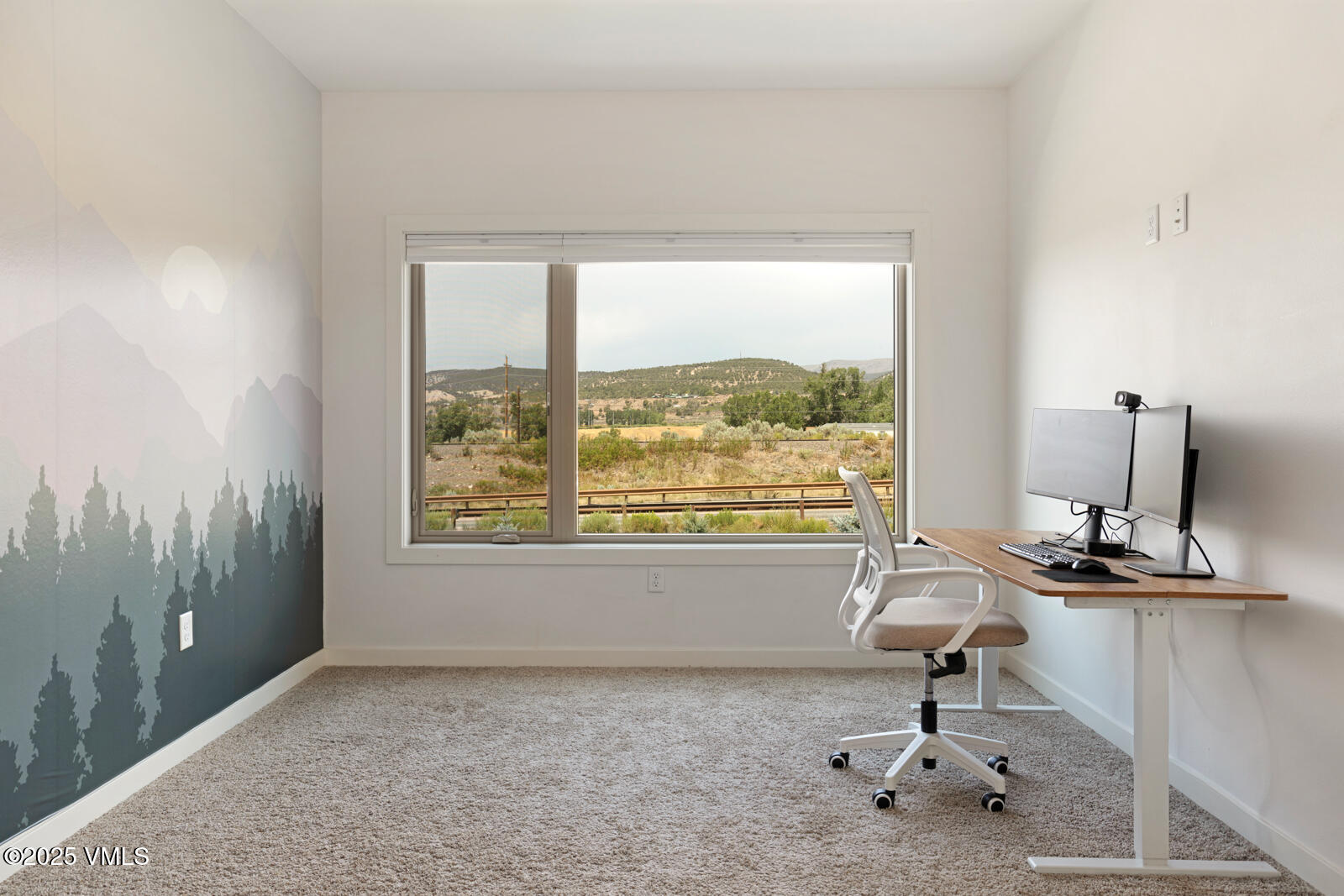 32 Flat Tops Court, Unit L3 Eagle, CO 81631 - Photo 20 of 28 a view of a room with a fireplace and window