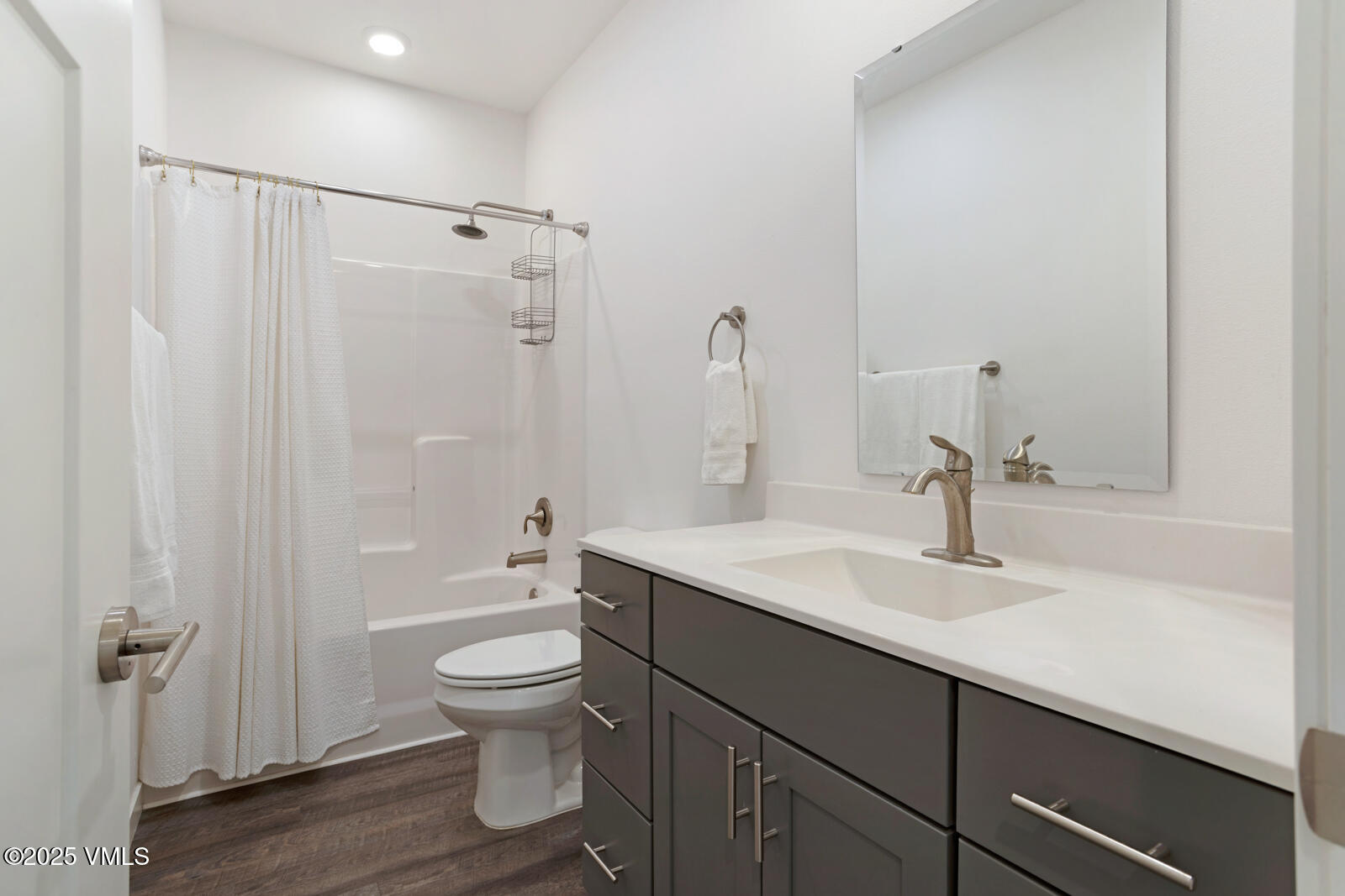 32 Flat Tops Court, Unit L3 Eagle, CO 81631 - Photo 22 of 28 a bathroom with a sink a toilet and shower