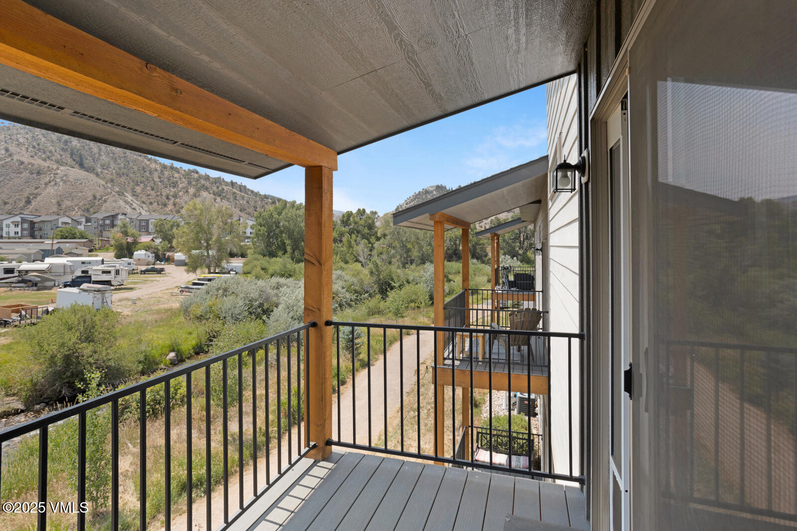 32 Flat Tops Court, Unit L3 Eagle, CO 81631 - Photo 24 of 28 a view of a balcony with wooden floor