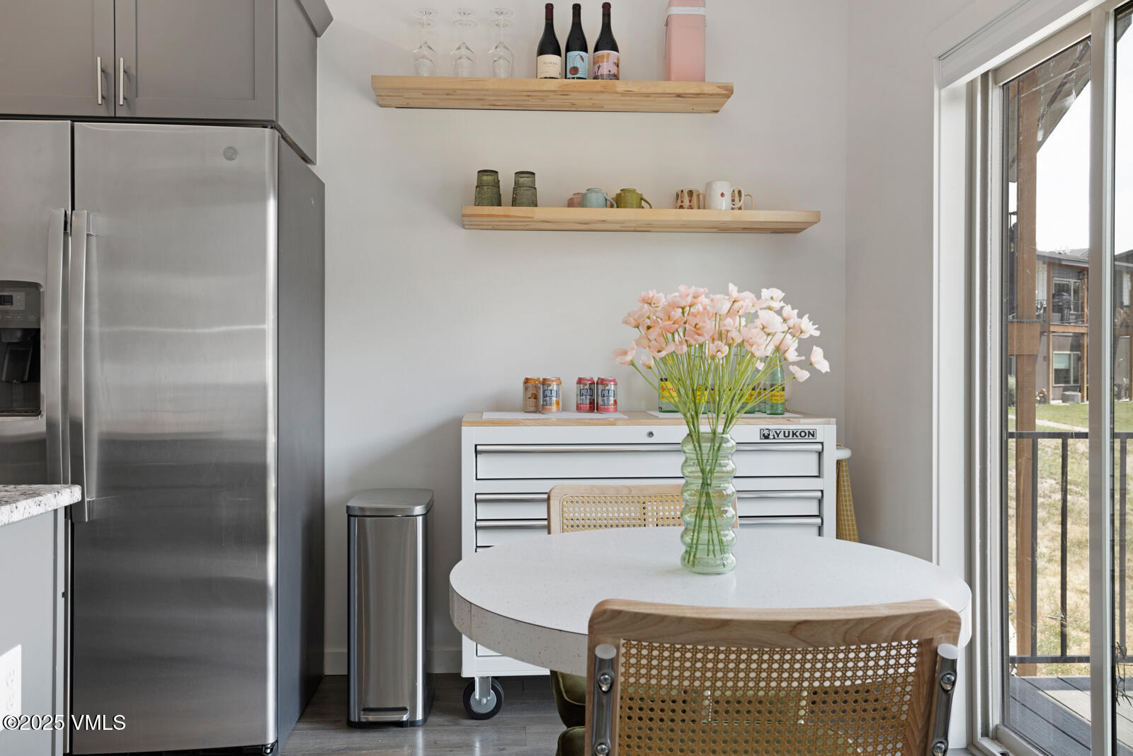 32 Flat Tops Court, Unit L3 Eagle, CO 81631 - Photo 6 of 28 a dining room with furniture and a chandelier