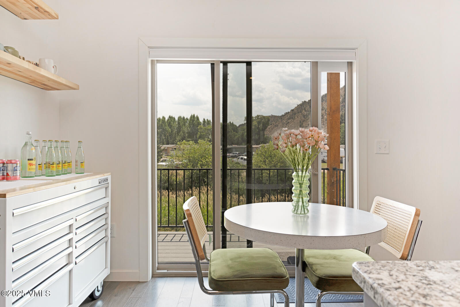32 Flat Tops Court, Unit L3 Eagle, CO 81631 - Photo 10 of 28 a view of a dining room with furniture window and wooden floor