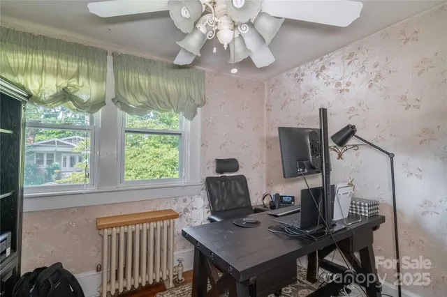 a room with furniture and chandelier