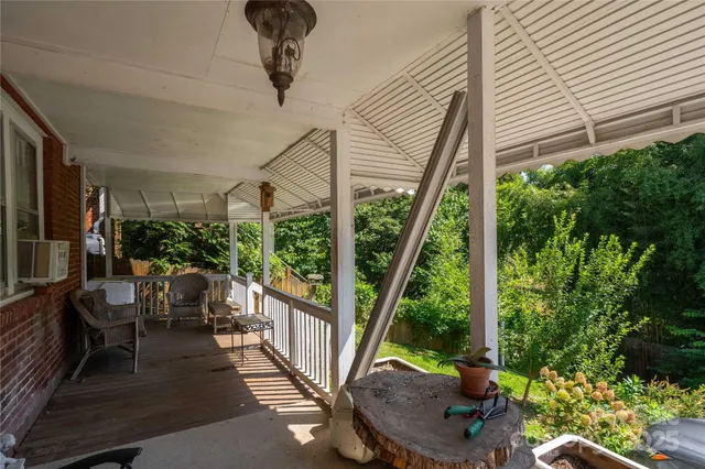 a view of a porch with a yard