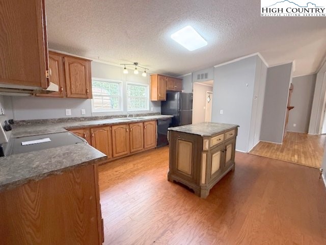 68 Rhoneys View Road Newland, NC 28657 - Photo 12 of 37 a kitchen with stainless steel appliances granite countertop a sink and a granite counter tops