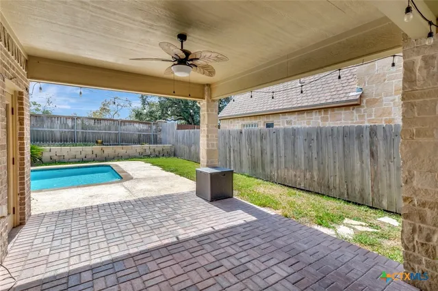 a view of a backyard with a garden