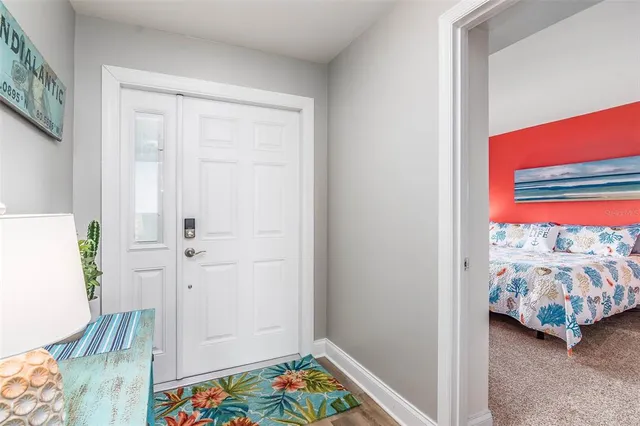 a view of bedroom with furniture and window