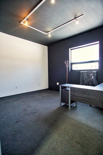 9142 Terminal Street Skokie, IL 60077 - Photo 9 of 11 a living room with furniture and a window