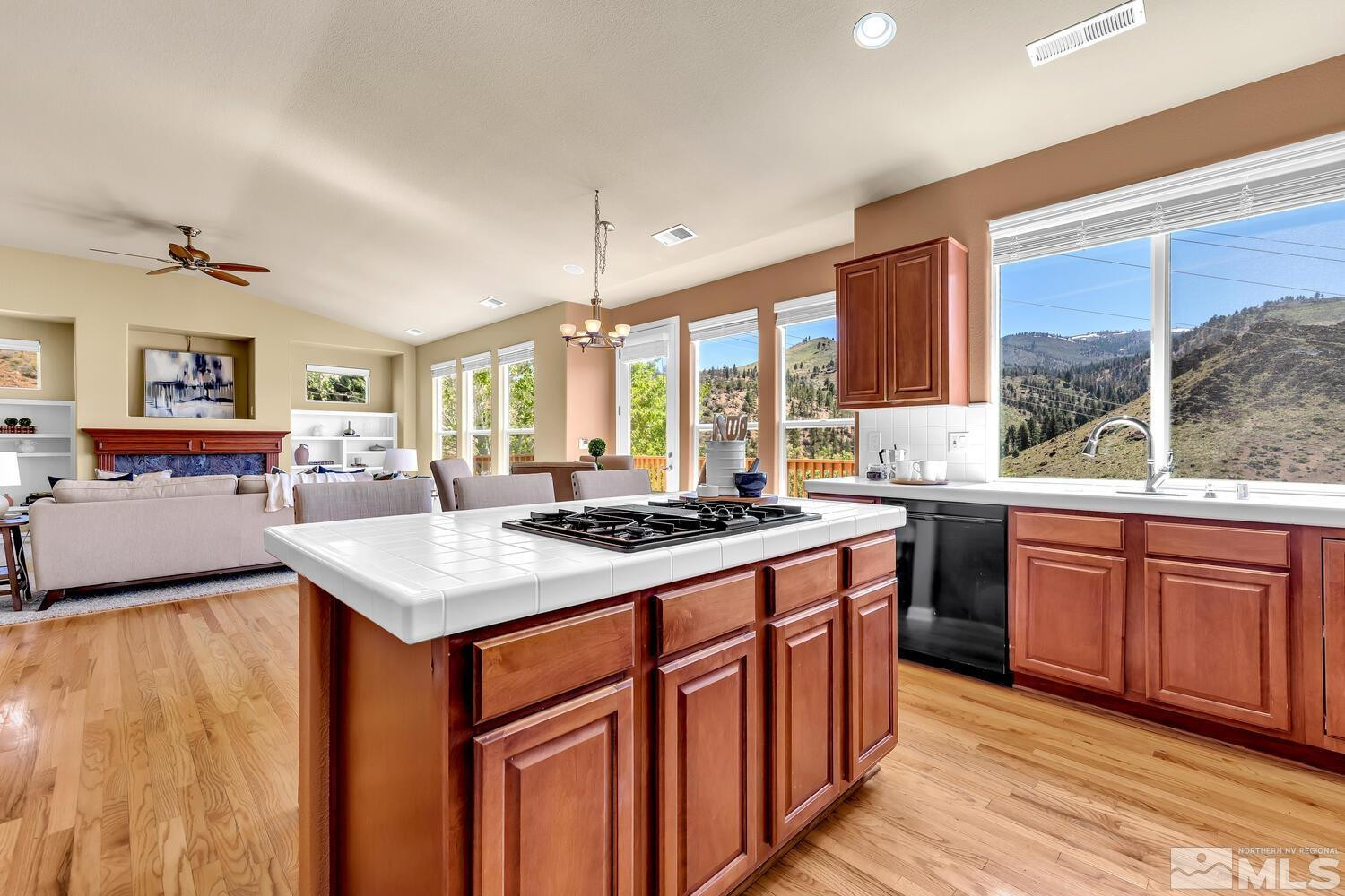 4965 Pinebluff Trail Reno, NV 89519 - Photo 16 of 40 a kitchen with stainless steel appliances granite countertop a stove a sink dishwasher and a refrigerator