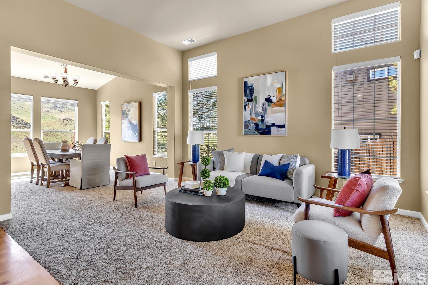4965 Pinebluff Trail Reno, NV 89519 - Photo 2 of 40 a living room with furniture and a potted plant