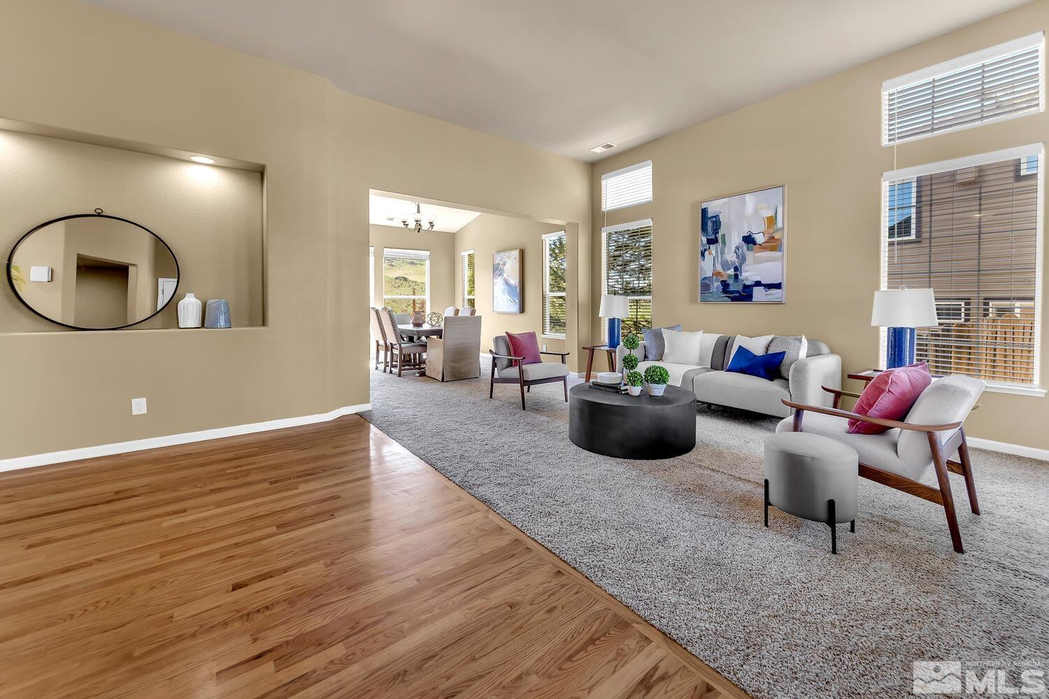 4965 Pinebluff Trail Reno, NV 89519 - Photo 3 of 40 a living room with furniture and a wooden floor