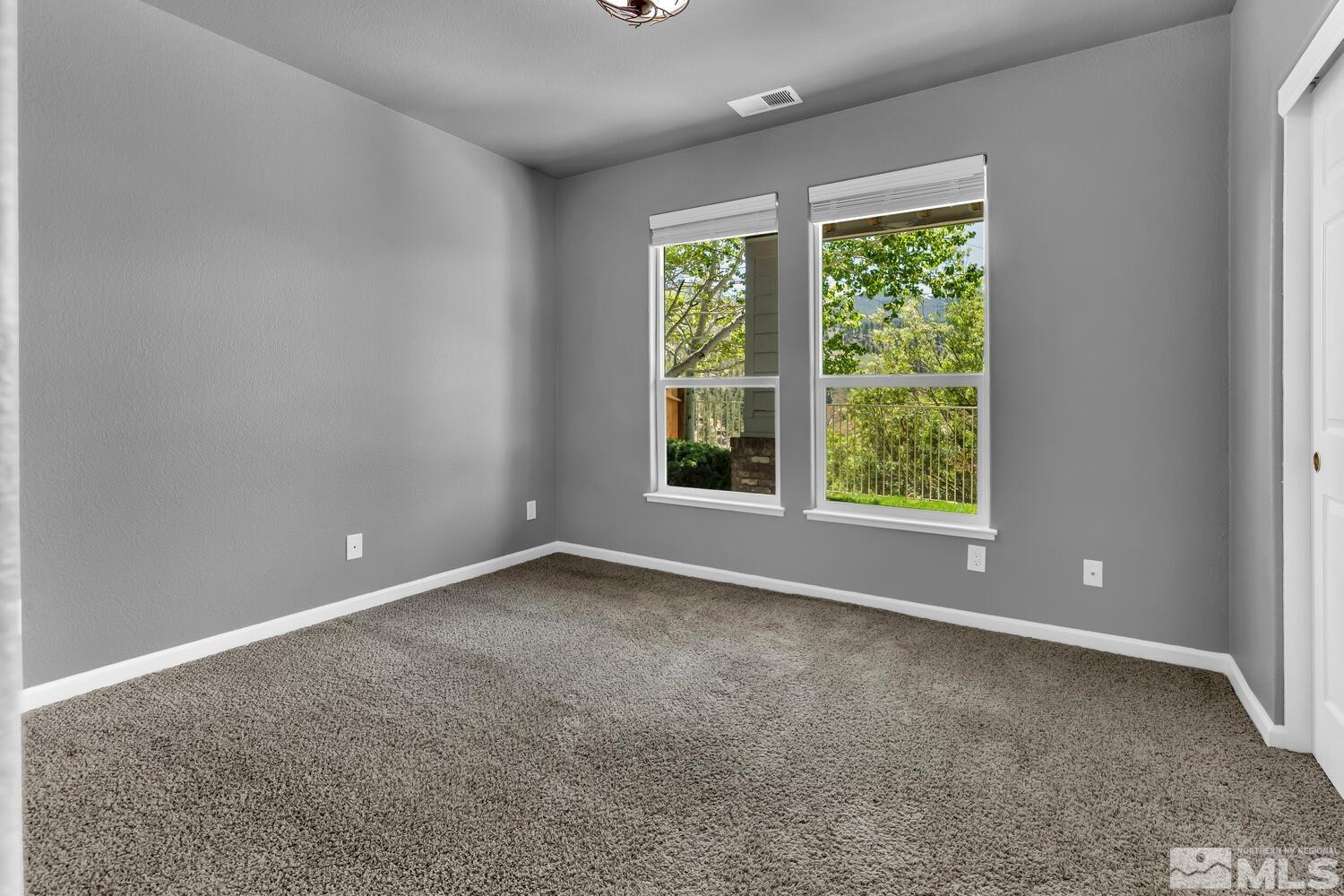 4965 Pinebluff Trail Reno, NV 89519 - Photo 32 of 40 an empty room with a window