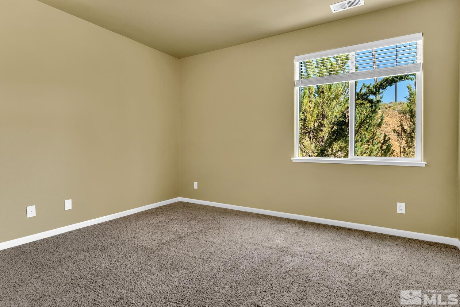 4965 Pinebluff Trail Reno, NV 89519 - Photo 34 of 40 an empty room with a window
