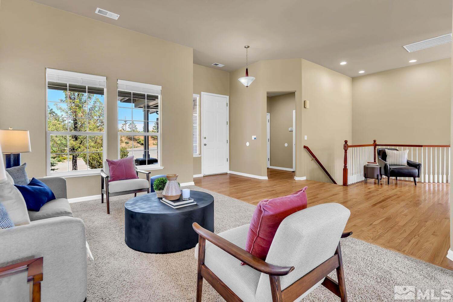4965 Pinebluff Trail Reno, NV 89519 - Photo 4 of 40 a living room with furniture and a potted plant