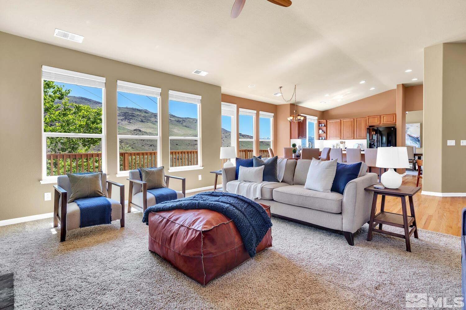 4965 Pinebluff Trail Reno, NV 89519 - Photo 8 of 40 a living room with furniture and a large window