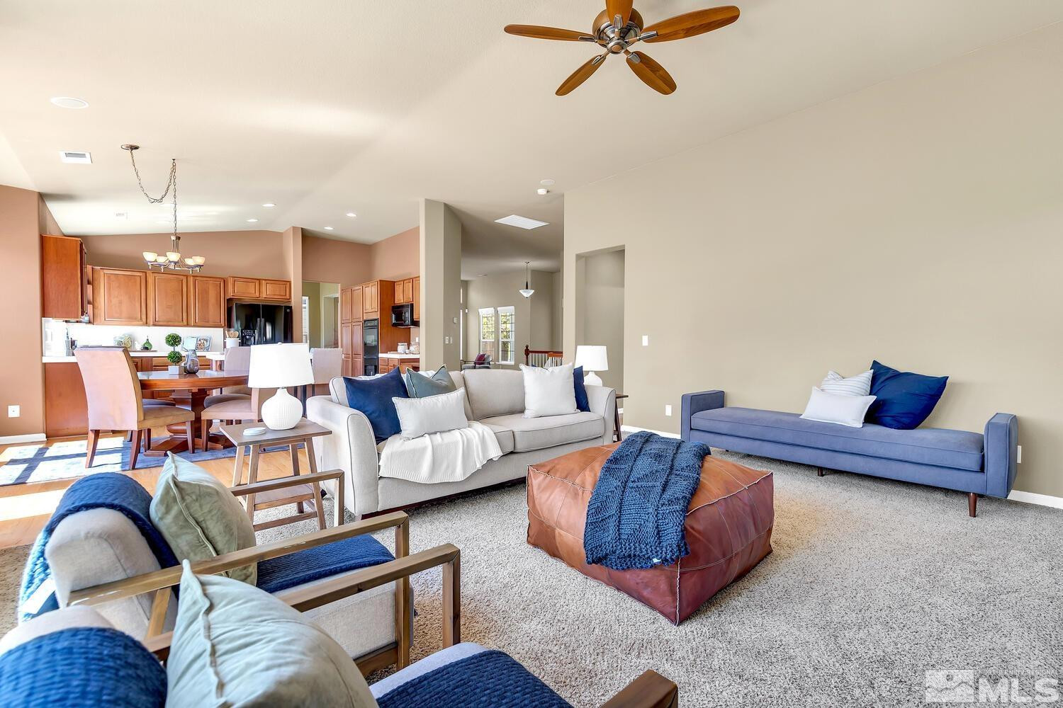 4965 Pinebluff Trail Reno, NV 89519 - Photo 9 of 40 a living room with furniture and kitchen view