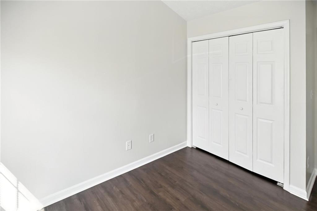 2537 Walden Lake Drive Decatur, GA 30035 - Photo 19 of 22 a view of an empty room with wooden floor