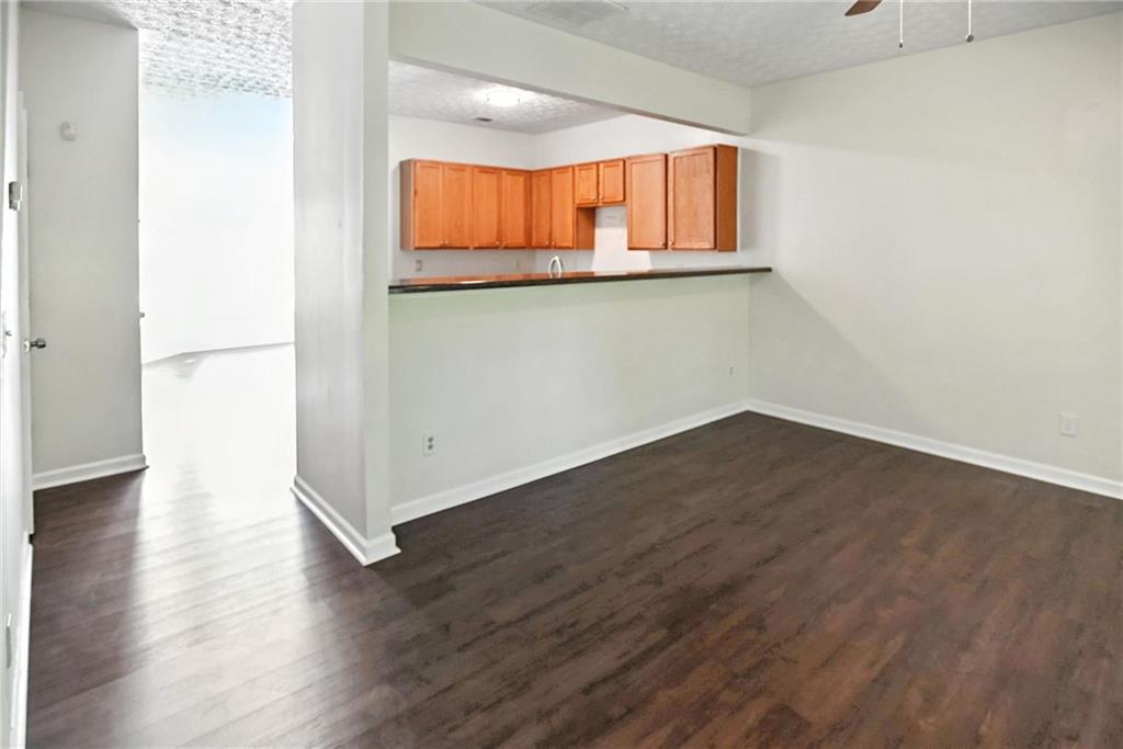 2537 Walden Lake Drive Decatur, GA 30035 - Photo 3 of 22 a view of a room with wooden floor and a window