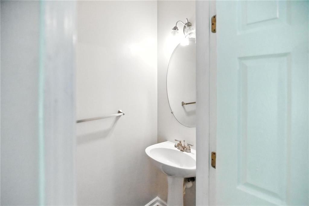 2537 Walden Lake Drive Decatur, GA 30035 - Photo 9 of 22 a bathroom with a sink a toilet and shower