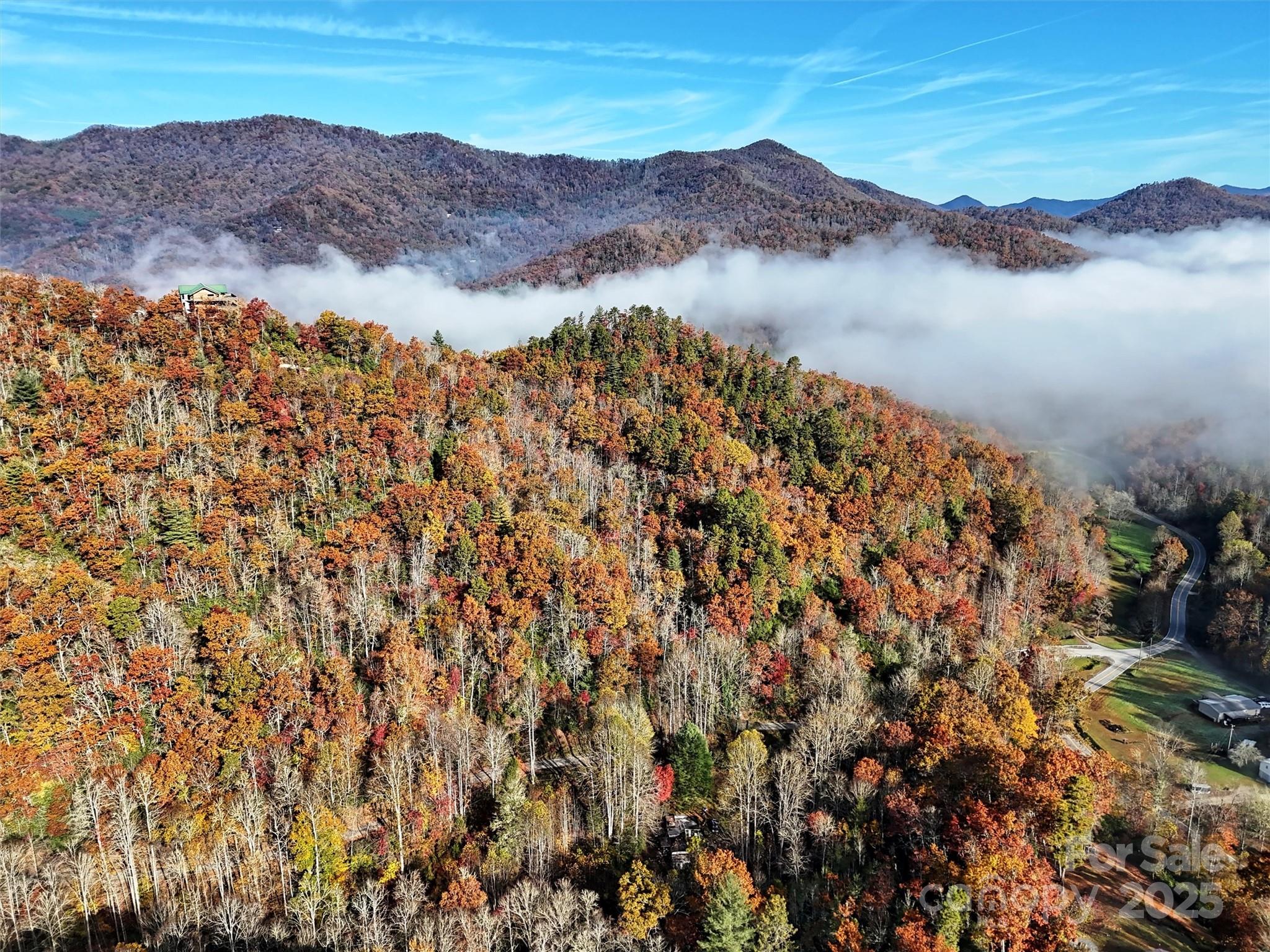 0 Brushy Fork Road Sylva, NC 28779 - Photo 2 of 7 a view of a lake with a mountain