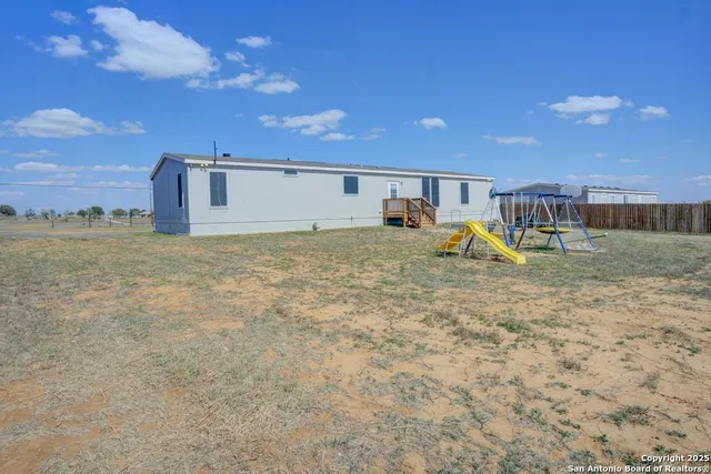 a view of an outdoor space and a yard