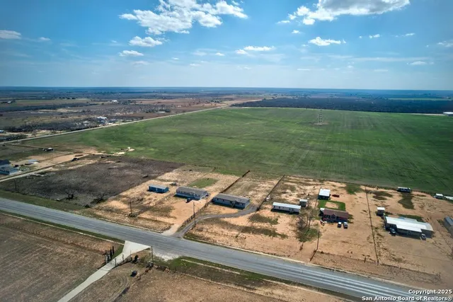a view of a balcony with an ocean view