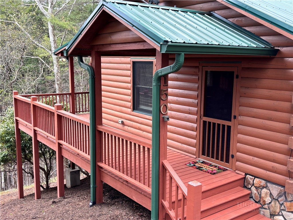 150 Turkey Ridge Crumpler, NC 28617 - Photo 6 of 40 a view of backyard with deck and wooden floor