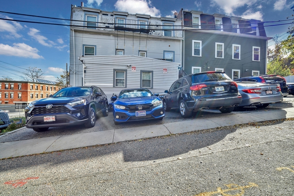 5-7 Everett Avenue, Unit 52 Boston, MA 02125 - Photo 11 of 12 a view of a car parked in front of a building