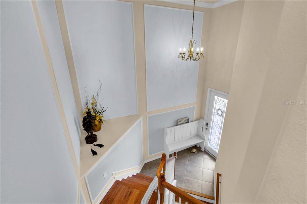 20201 Ragazza Circle, Unit 201 Venice, FL 34293 - Photo 13 of 58 a view of an entryway with wooden floor