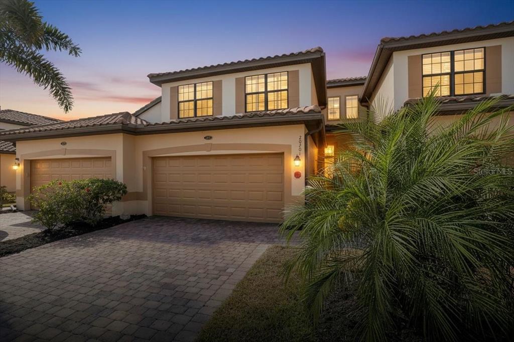 20201 Ragazza Circle, Unit 201 Venice, FL 34293 - Photo 2 of 58 a front view of a house