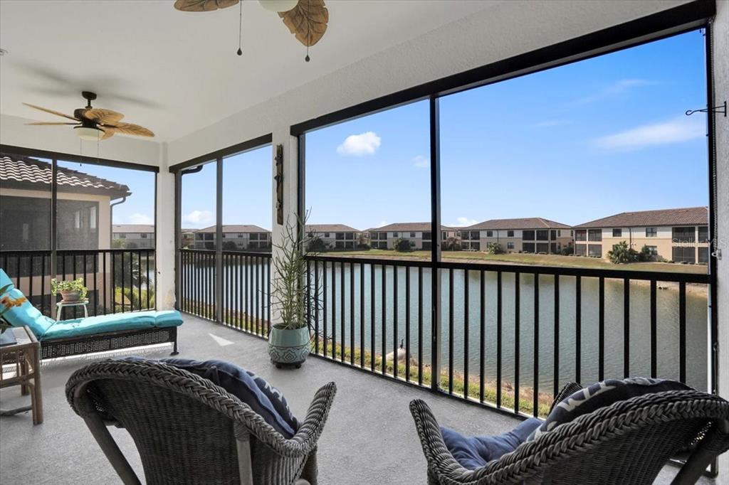 20201 Ragazza Circle, Unit 201 Venice, FL 34293 - Photo 26 of 58 a balcony with furniture