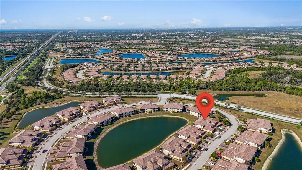 20201 Ragazza Circle, Unit 201 Venice, FL 34293 - Photo 57 of 58 an aerial view of a city