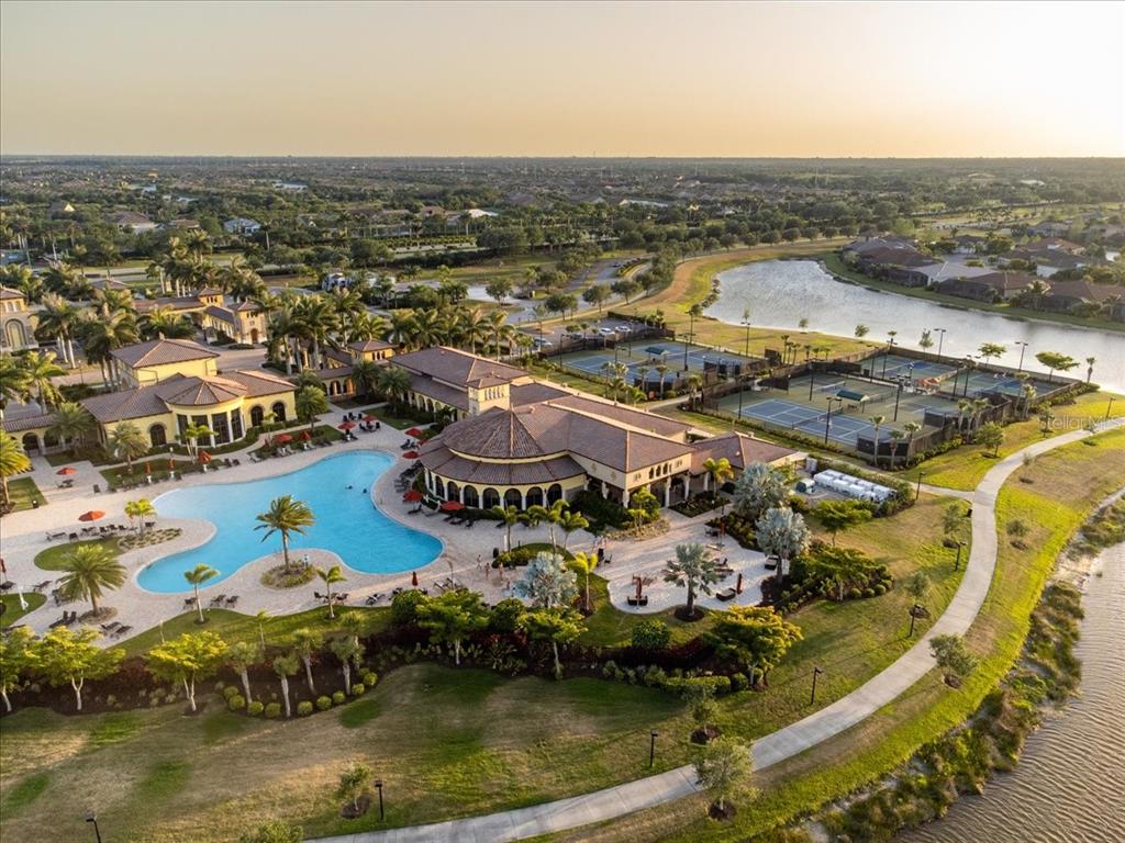20201 Ragazza Circle, Unit 201 Venice, FL 34293 - Photo 9 of 58 an aerial view of residential houses with outdoor space
