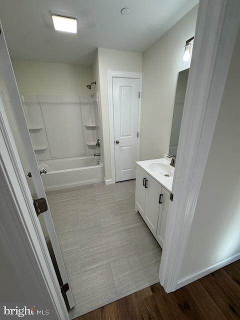 406 Charles Street Hurlock, MD 21643 - Photo 6 of 8 a bathroom with a tub sink a toilet and a shower