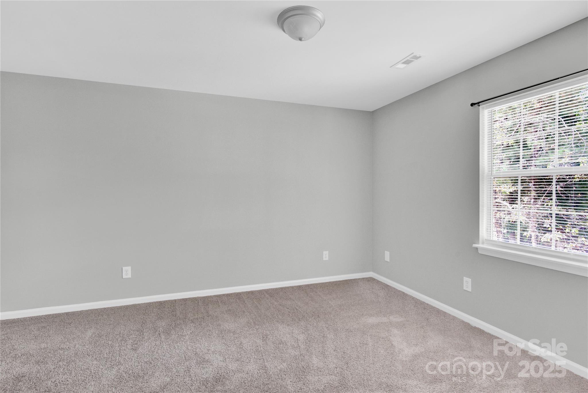 2848 Ridge Crossing Court Northwest Concord, NC 28027 - Photo 17 of 37 a view of an empty room with a window