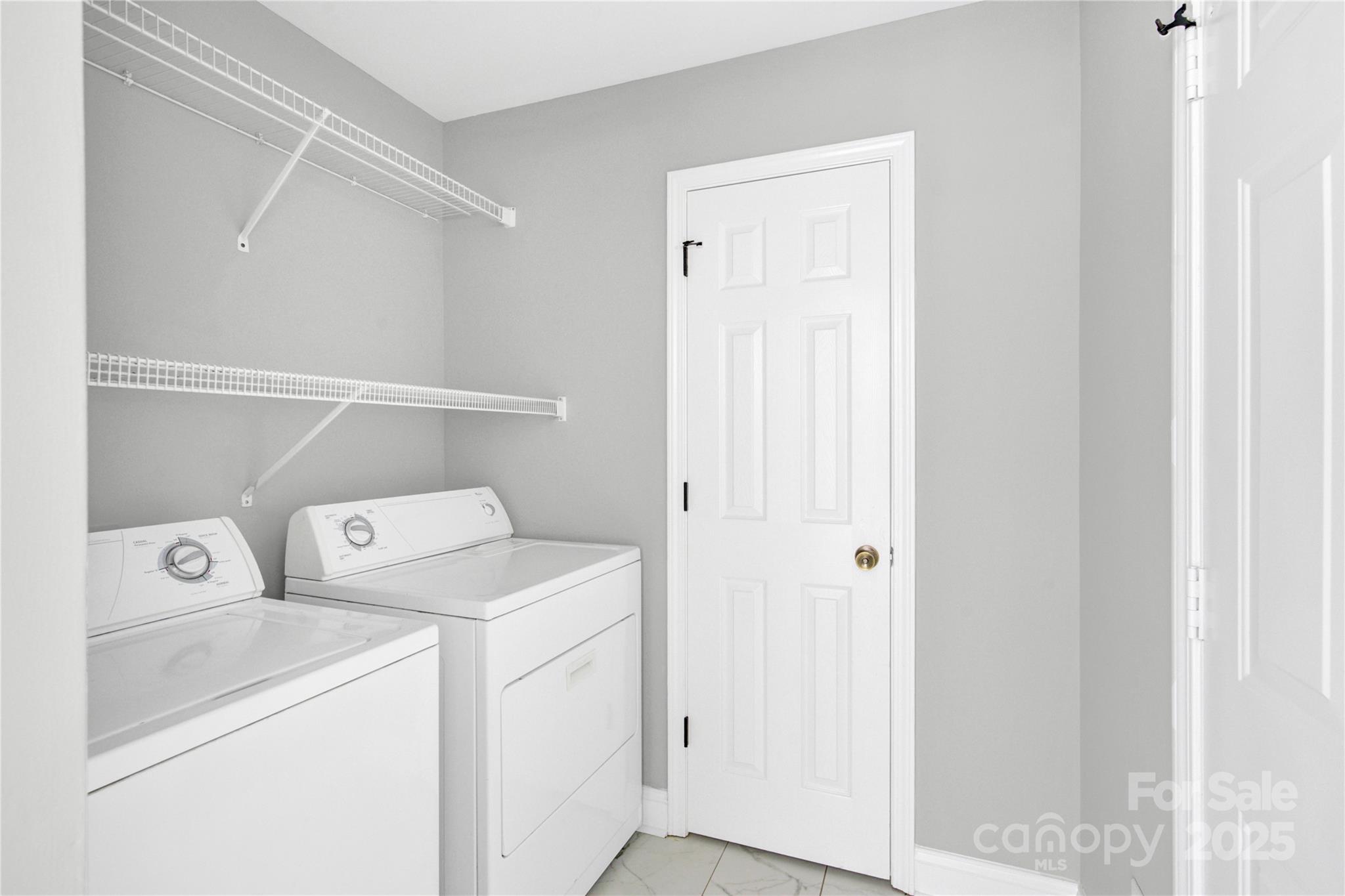 2848 Ridge Crossing Court Northwest Concord, NC 28027 - Photo 25 of 37 a utility room with dryer and washer