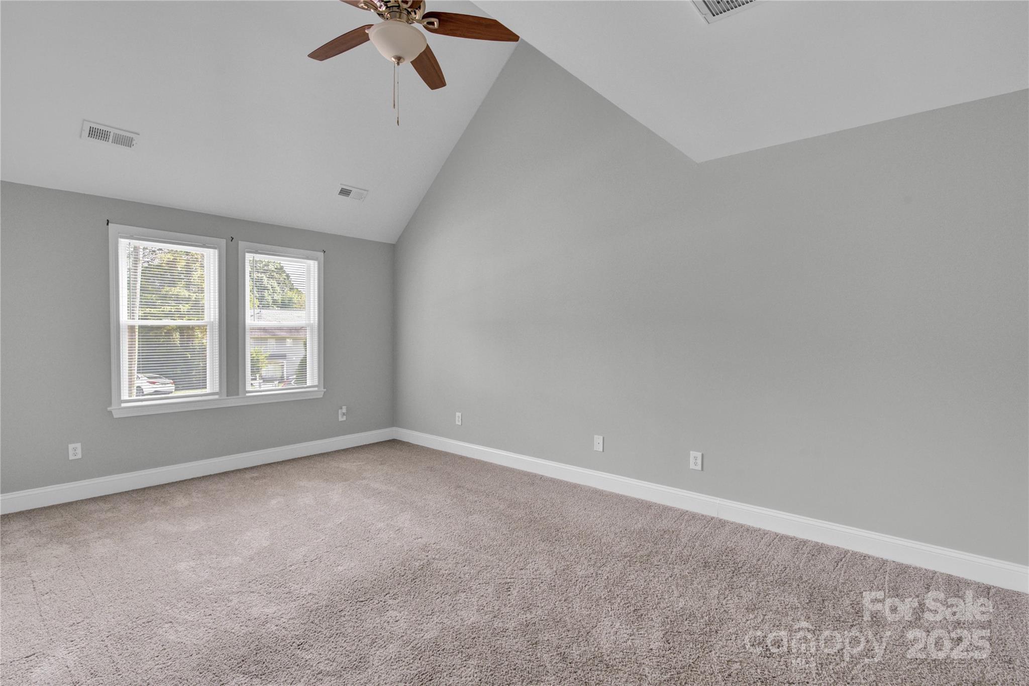 2848 Ridge Crossing Court Northwest Concord, NC 28027 - Photo 32 of 37 wooden floor in an empty room with a window