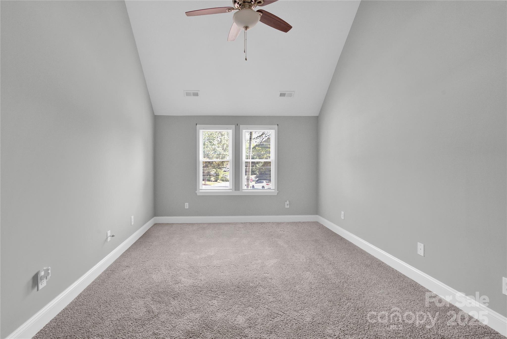 2848 Ridge Crossing Court Northwest Concord, NC 28027 - Photo 33 of 37 an empty room with a window and a fan