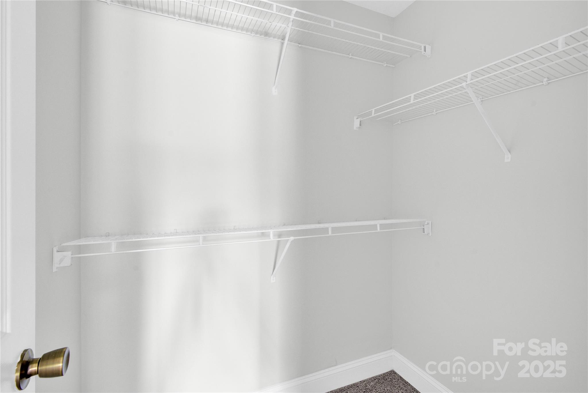 2848 Ridge Crossing Court Northwest Concord, NC 28027 - Photo 35 of 37 a view of an empty walk in closet