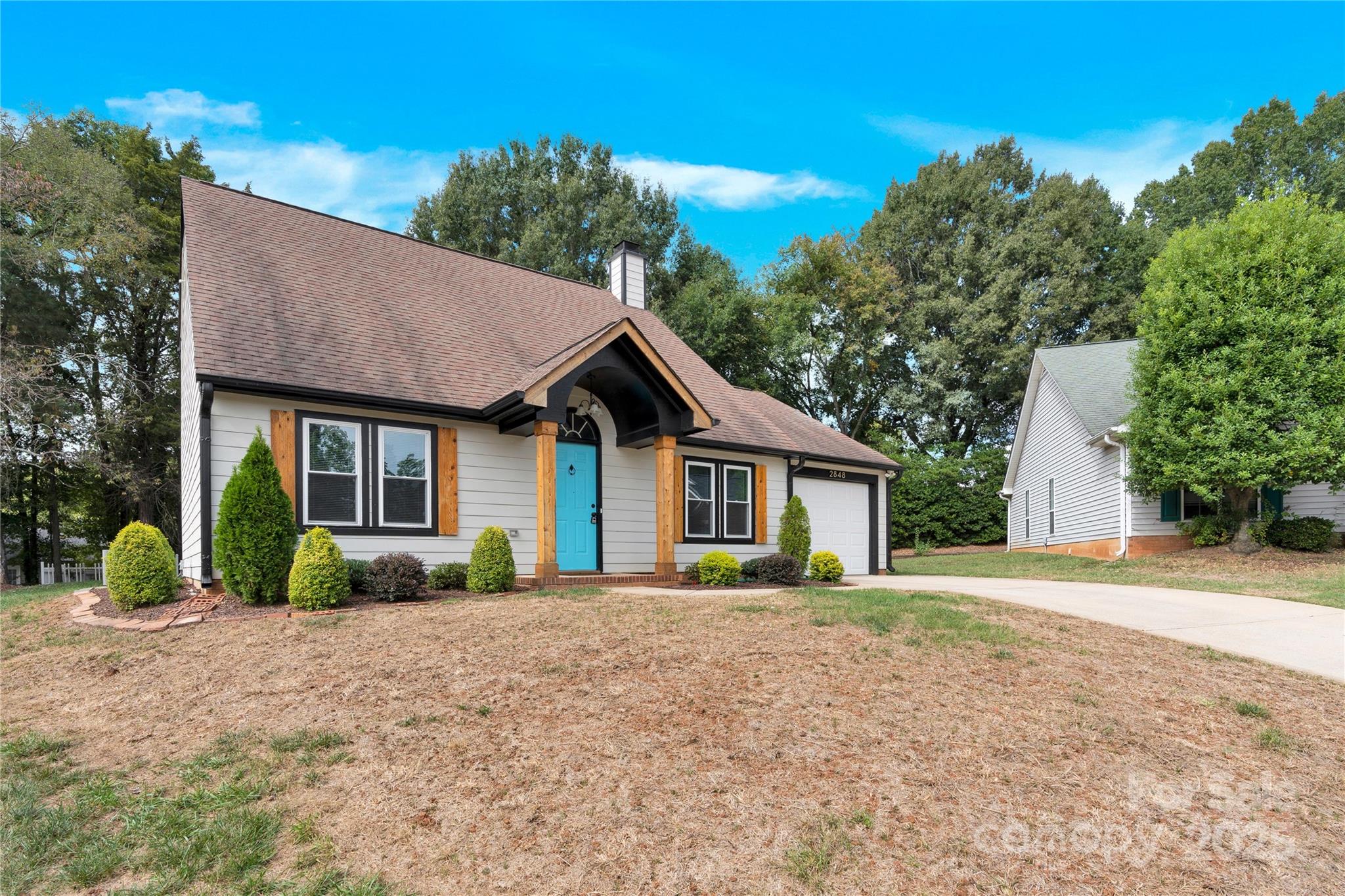 2848 Ridge Crossing Court Northwest Concord, NC 28027 - Photo 7 of 37 a front view of a house with a yard