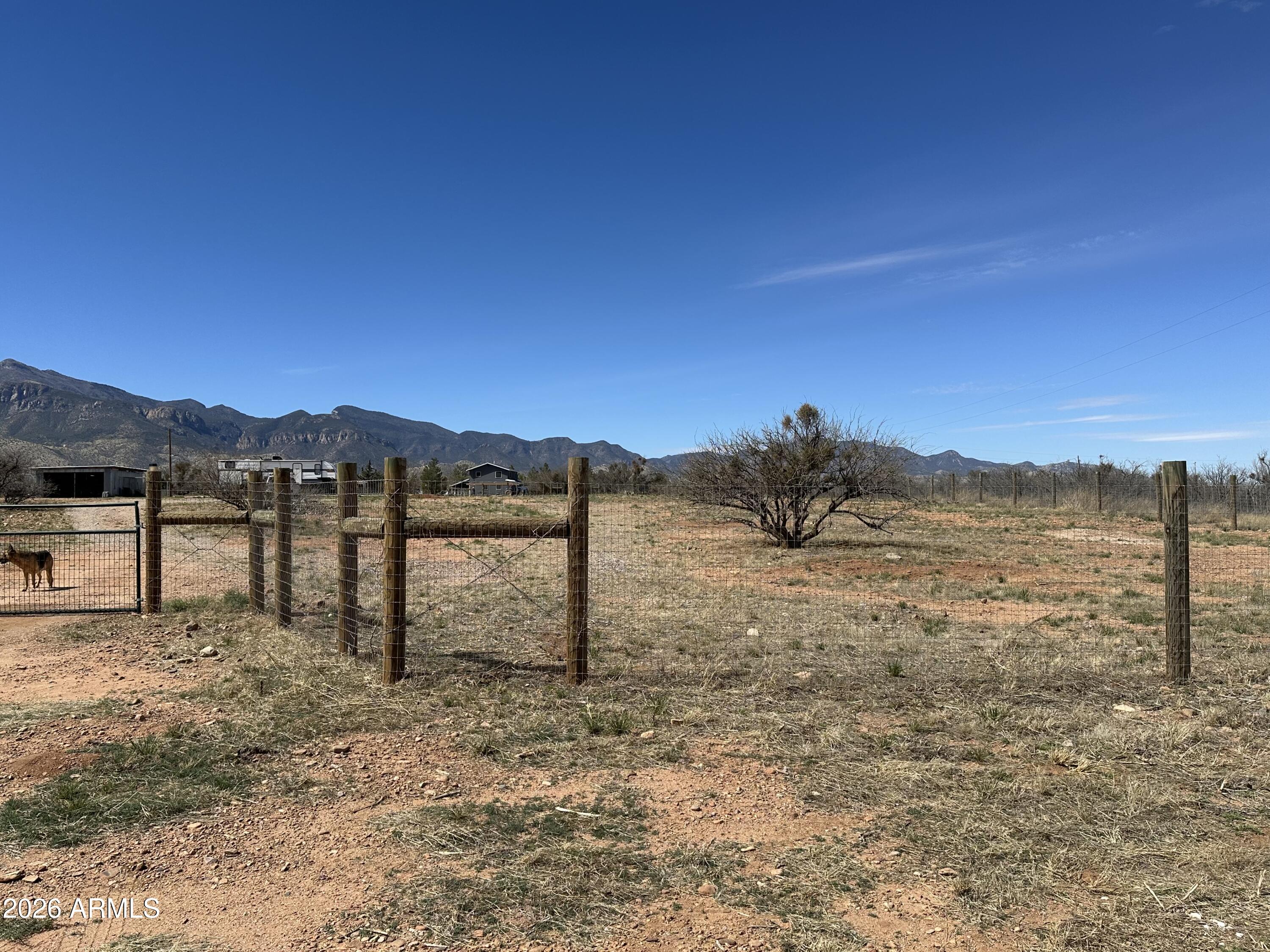 5778 South Kino Road Hereford, AZ 85615 - Photo 14 of 18 a view of a dry yard with mountain